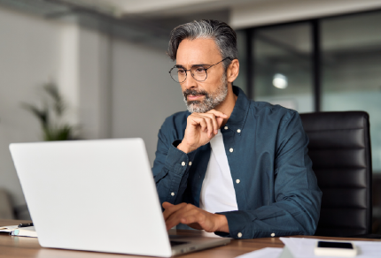 Man looking at laptop